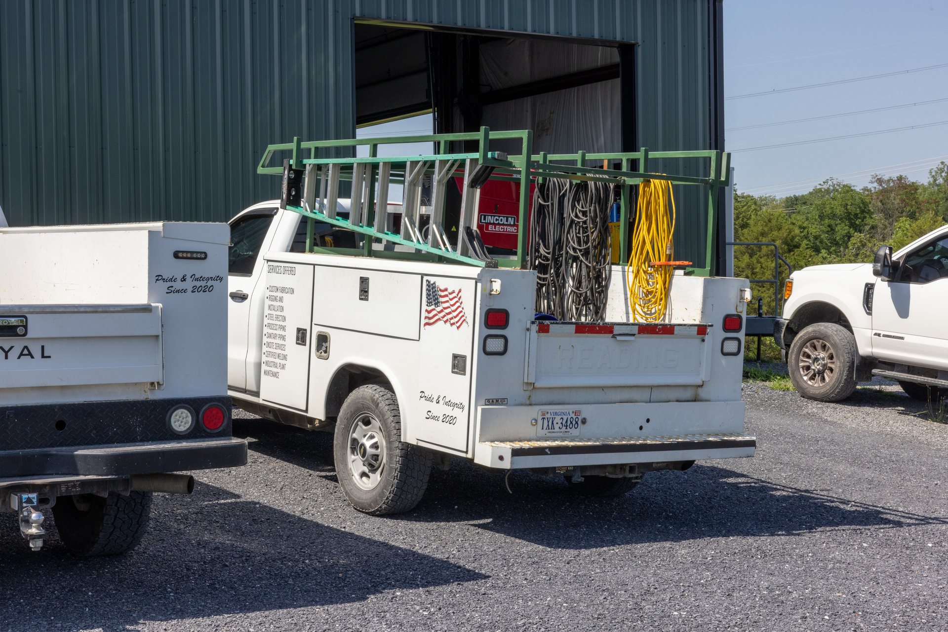 Welder, leads, and pipe rack on the mobile welding service truck in Middletown, VA
