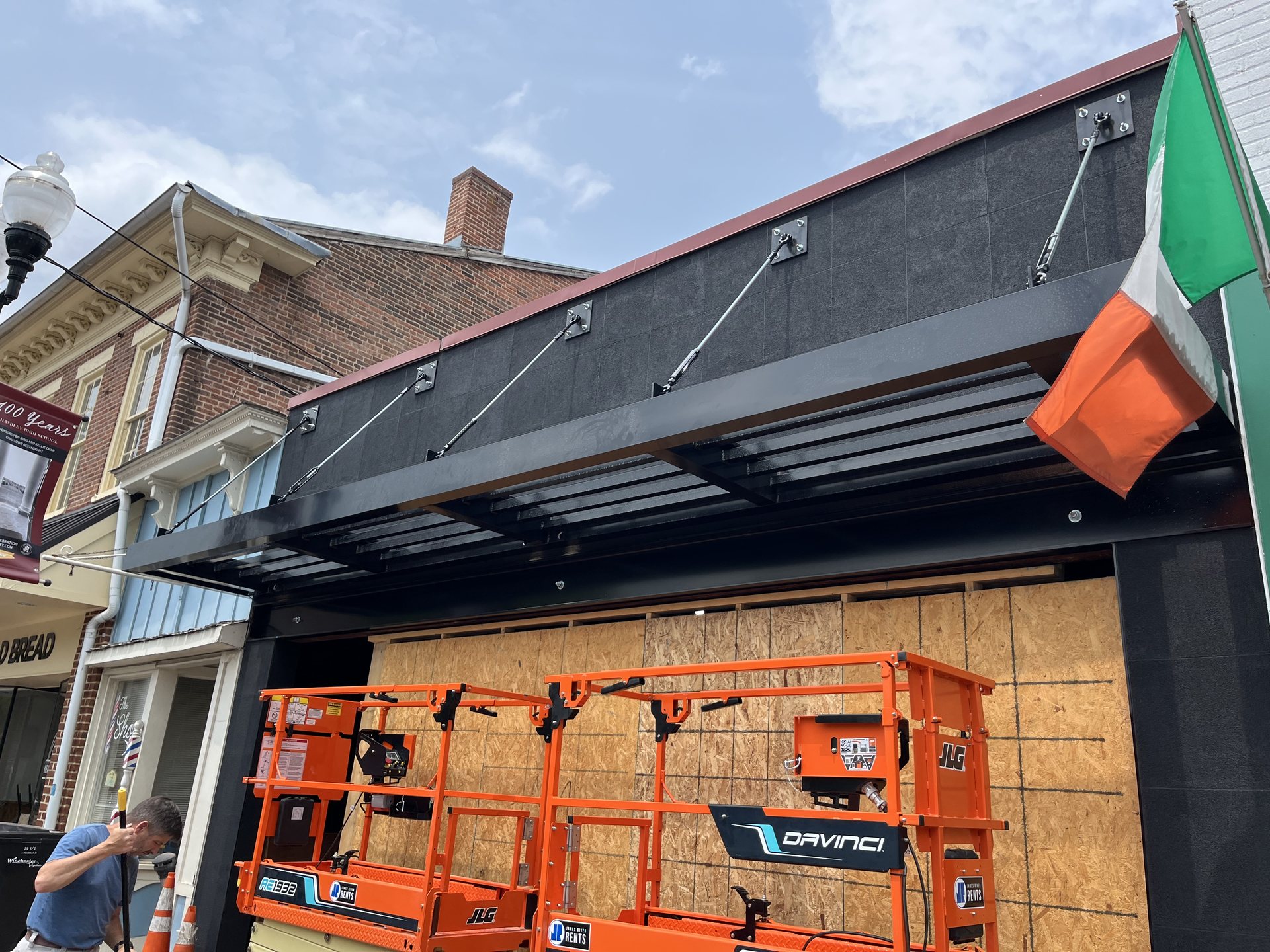 Black steel storefront canopy with cable stays fabricated and installed near Winchester, VA