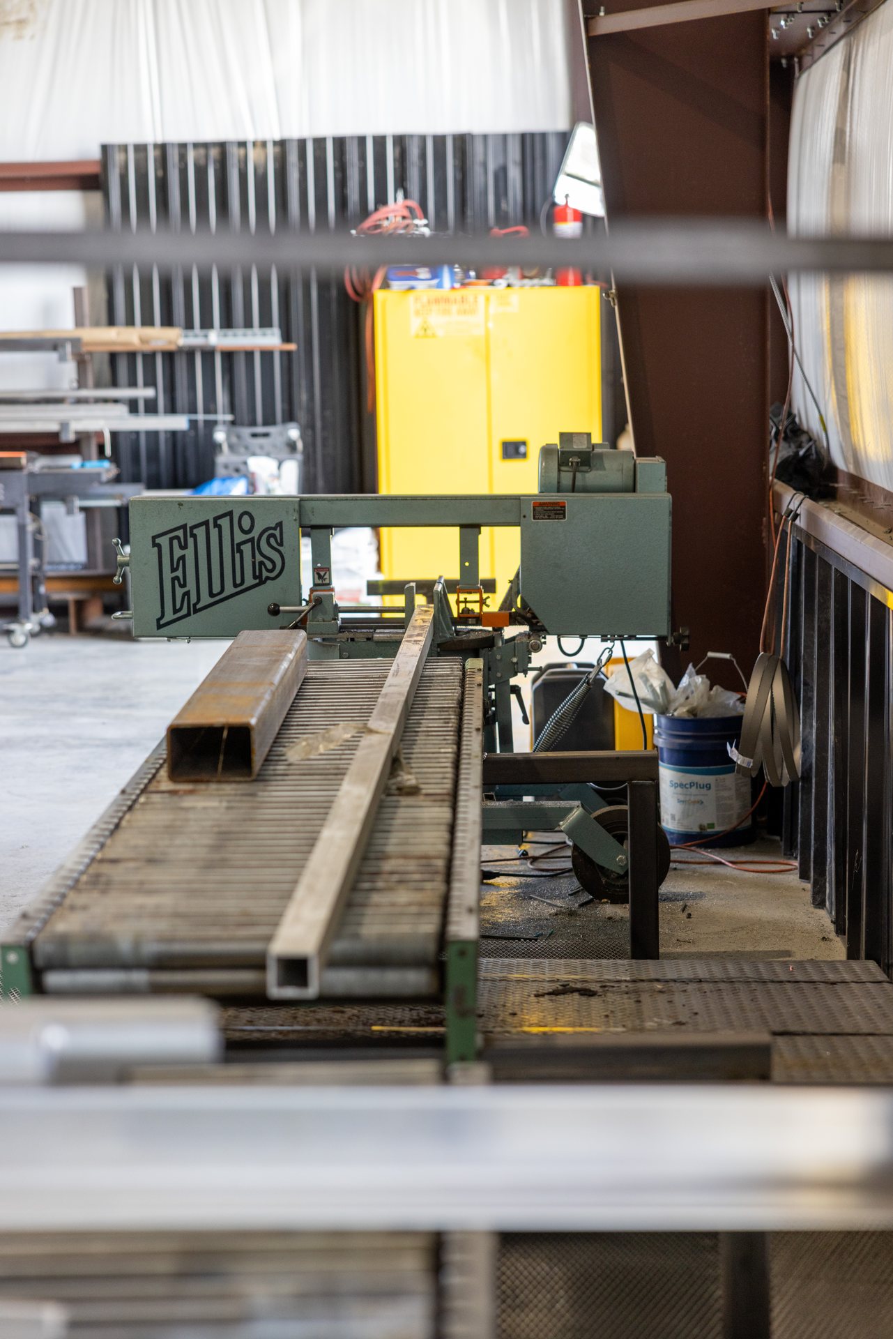 Structural steel tube staged on the band saw at the Middletown, VA welding shop
